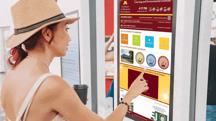 Animated, digital signage touchscreen displaying university services, Reach Media Network, 2025