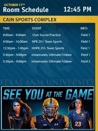 Cain Sports Complex horizontal digital signage screen from Reach Media Network displaying room schedule and sports imagery for East Texas A&M University